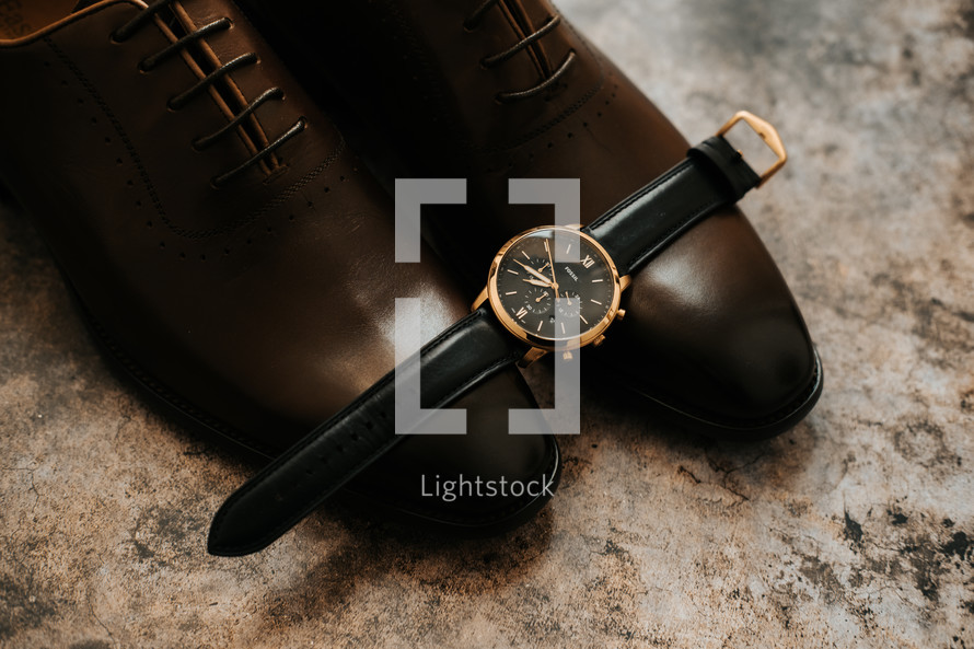 watch and dress shoes 