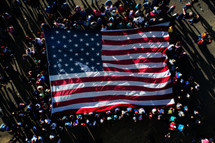 AI Image. Top view on people holding USA flag