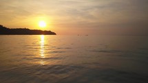 Aerial cinematic drone longboats orange sunrise sunset Koh Phi Phi Islands Thailand 
