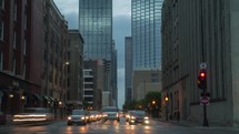 Hyper time lapse of cars driving through downtown Dallas, Texas streets.