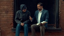 Christian Witnessing to Man on Street
