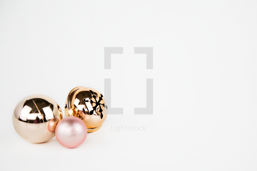 Christmas ornaments and bell on white 