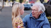 Little Girl Talks With Grandma Small Town