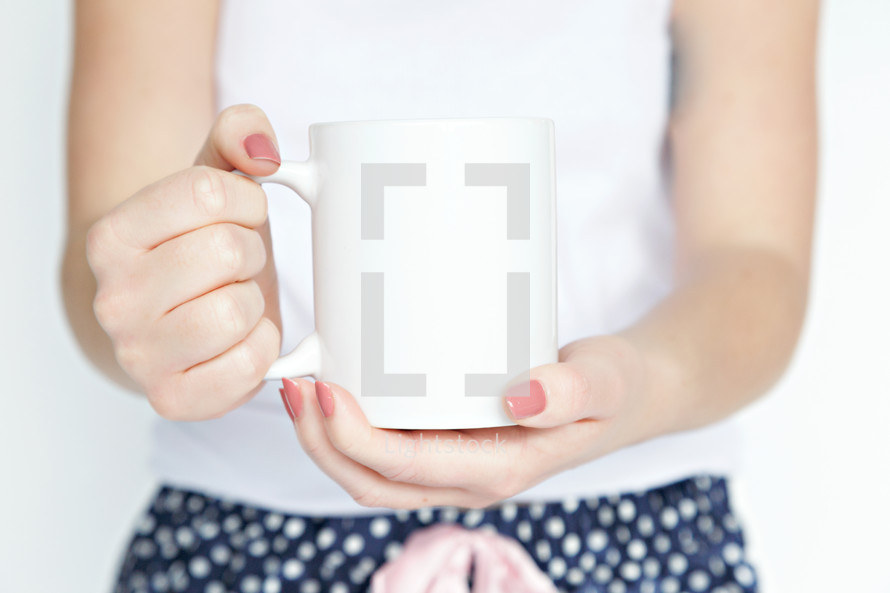 woman holding a mug 