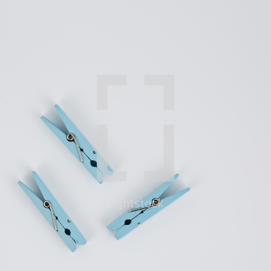clothespins on a white background 