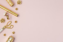 gold holiday bows and gift wrapping 