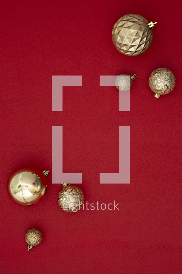 Christmas ornaments on red background 