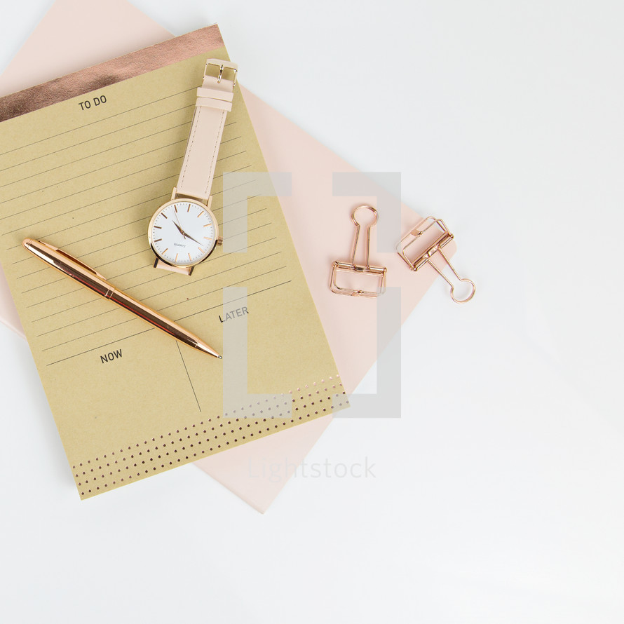 to do list, pen, candle, pink, gold, notepad, watch, pink, clips, white background 