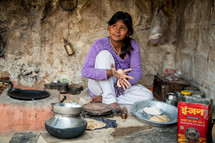 a woman cooking in India 