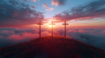 Three crosses on a hill at sunset with clouds on blue sky. Easter, resurrection, new life, redemption concept. 
