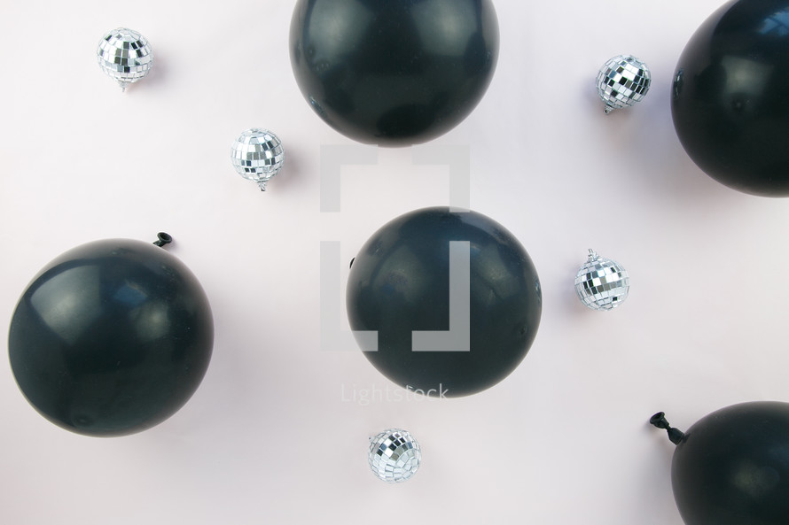 black balloons and mirrored disco balls 