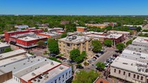 Tracking Aerial of Downtown McKinney Texas in Spring