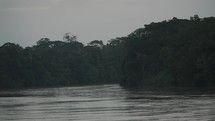 View Of Amazon River And Rainforest On A Gloomy Day In Ecuador - wide	