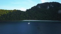 Aerial cinematic drone May Bay lone sailboat 