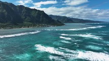 Cinematic sunny view of Kualoa Beach in Hawaii.