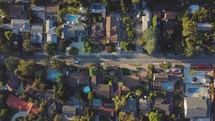 Aerial view of a beautiful neighborhood near Los Angeles with lots of green trees.