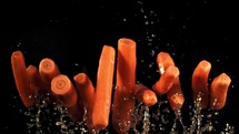 Fresh carrots . Filmed is slow motion 1000 fps.