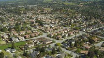 aerial view over homes in a neighborhood 