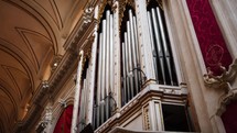Ancient pipe organ inside a church