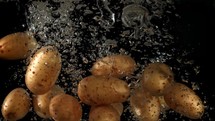 Potatoes fall. Filmed is slow motion 1000 fps.
