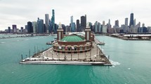 Cinematic aerial view of the Navy Pier in Downtown Chicago.