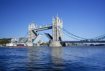 Tower Bridge and the River Thames with the Drawbridge raised.  London. England.- for editorial use only 