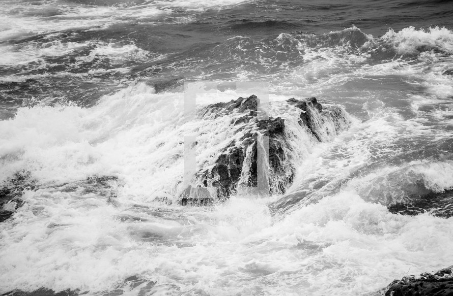 waves washing over rocks 
