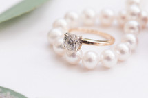 engagement ring and pearls 