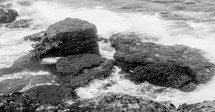 tide washing over rocks 