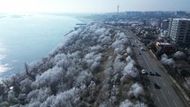 Snowscape Trees At The Coastal City Road In Galati, Romania. Aerial Drone Shot	