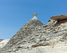 Detail of the dry stone roof of a trullo, a traditional apulian dry stone hut with a conical roof