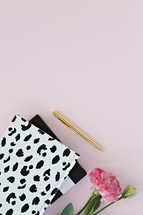 dalmatian spotted notebook, pink carnation, and gold pen 