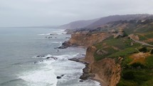 Aerial Cinematic drone rugged coastline cliffs Santa Cruz Half Moon Bay Davenport Big Sur coastal Highway 1 California