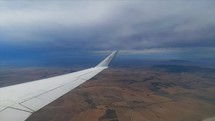 Aviation airplane wing timelapse flying Johannesburg to Cape Town South Africa 
