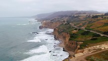 Aerial Cinematic drone rugged coastline cliffs Santa Cruz 