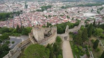 Convent of christ in tomar, portugal, with surrounding landscape and buildings, aerial view