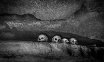 skulls in a cave