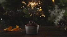 Crumble dessert with sparkler in the spirit of Christmas