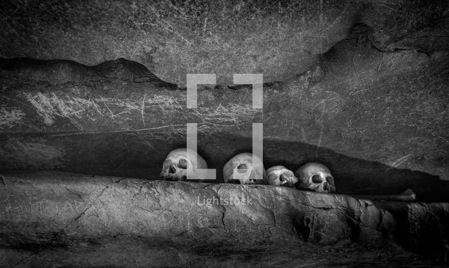 skulls in a cave