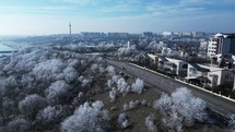 Galati TV Tower In Distance Seen From Galati City In Romania During Winter. aerial shot	