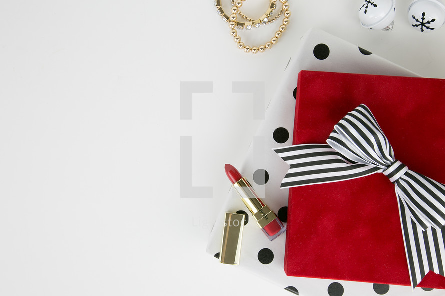 lipstick, earrings, bracelets,  makeup, presents,  polka dots, gold, red, black, white, white background 