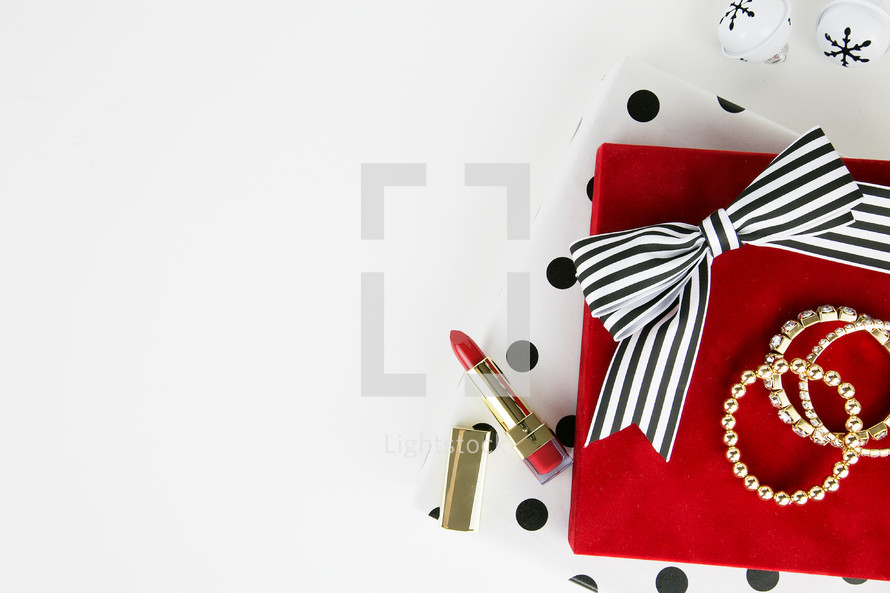 lipstick, earrings, bracelets,  makeup, presents,  polka dots, gold, red, black, white, white background 