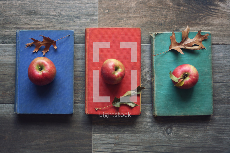 vintage books with apples 