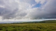 Cloud Timelapse Moving Over Colorful Grassy Shrubland On Dartmoor