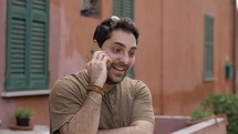 a man talking on a cellphone 