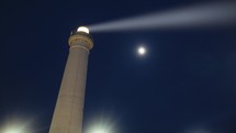 Lighthouse near the moon in the night