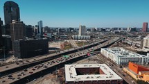 Rotating Aerial of Interstate Cars and Traffic - Downtown Dallas, Texas	