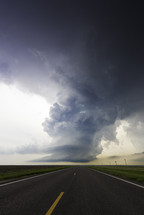 Awesome Storm Cloud Looming Over An Empty Road