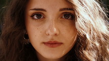 face of a young woman closeup 