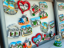 Colorful souvenir magnets showcasing the unique trulli houses of alberobello, a unesco world heritage site in puglia, italy